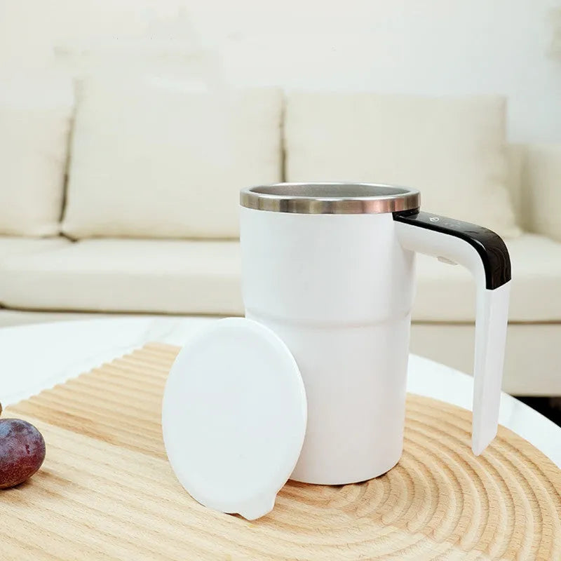 White automatic stirring electric mug with LCD temperature display and USB charging cable