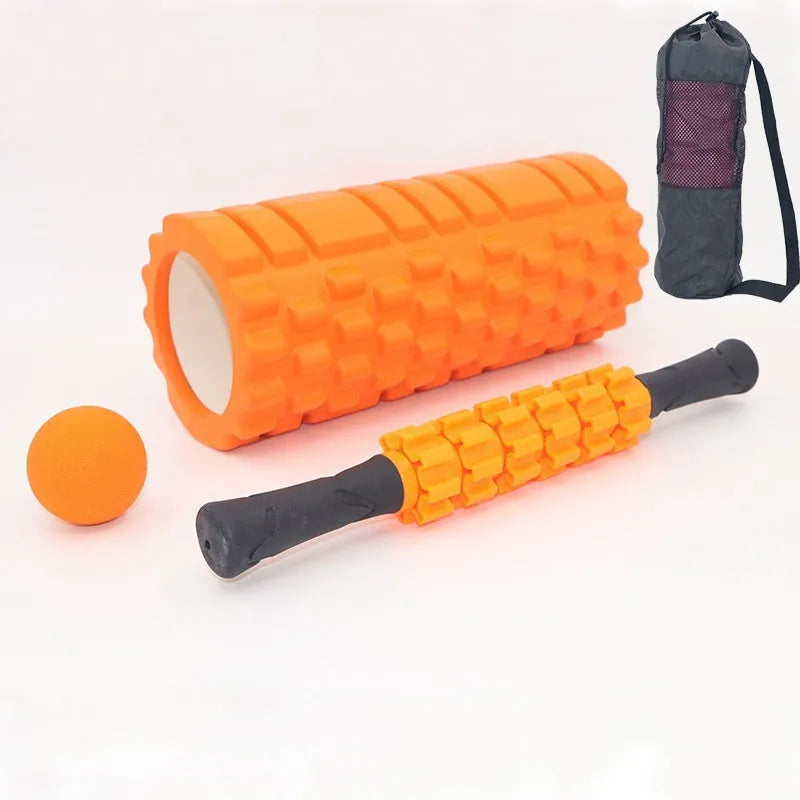 Black 33cm gear-textured foam massage roller on a white background.