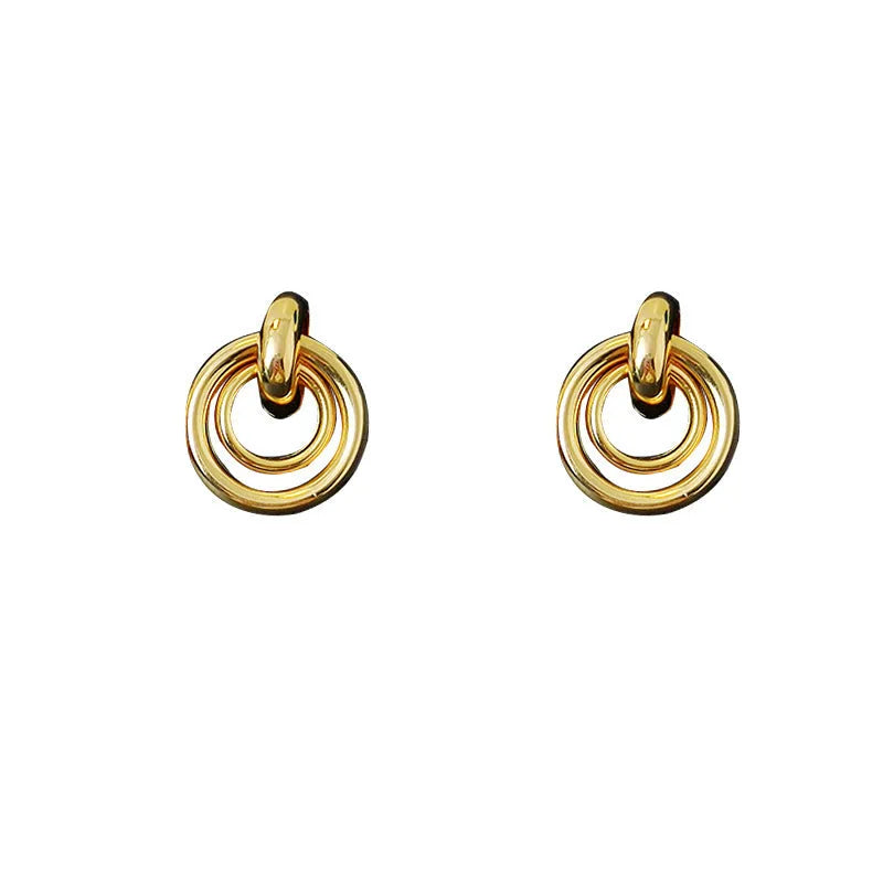 Women's geometric round ring earrings with irregular design in gold or silver electroplated finish