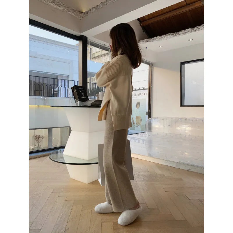 Women's high-waist knitted wide-leg trousers in cream white, floor-length design for winter wear