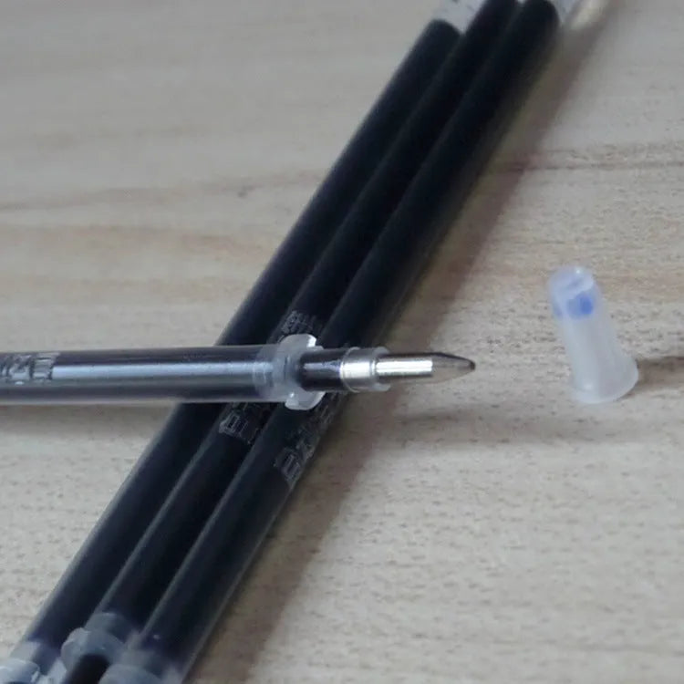 Automatic fade and disappear pen set with clear plastic holder and eight refill cartridges.