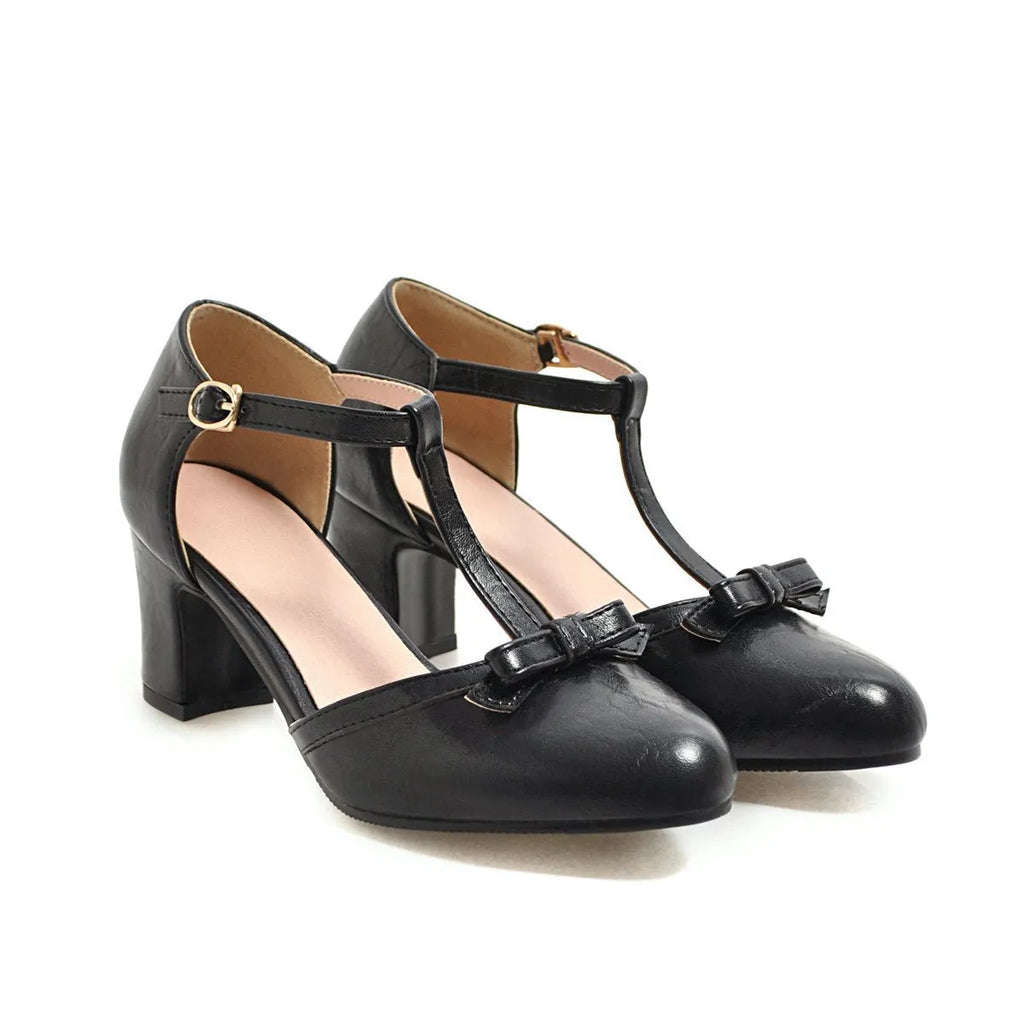 Women's chunky heel sandals with bow tie decoration and hollow out design in PU material