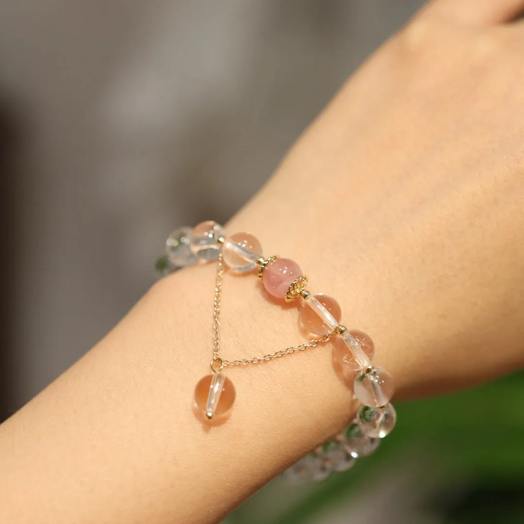 White crystal bracelet with cat eye obsidian details in Chinese geometric style