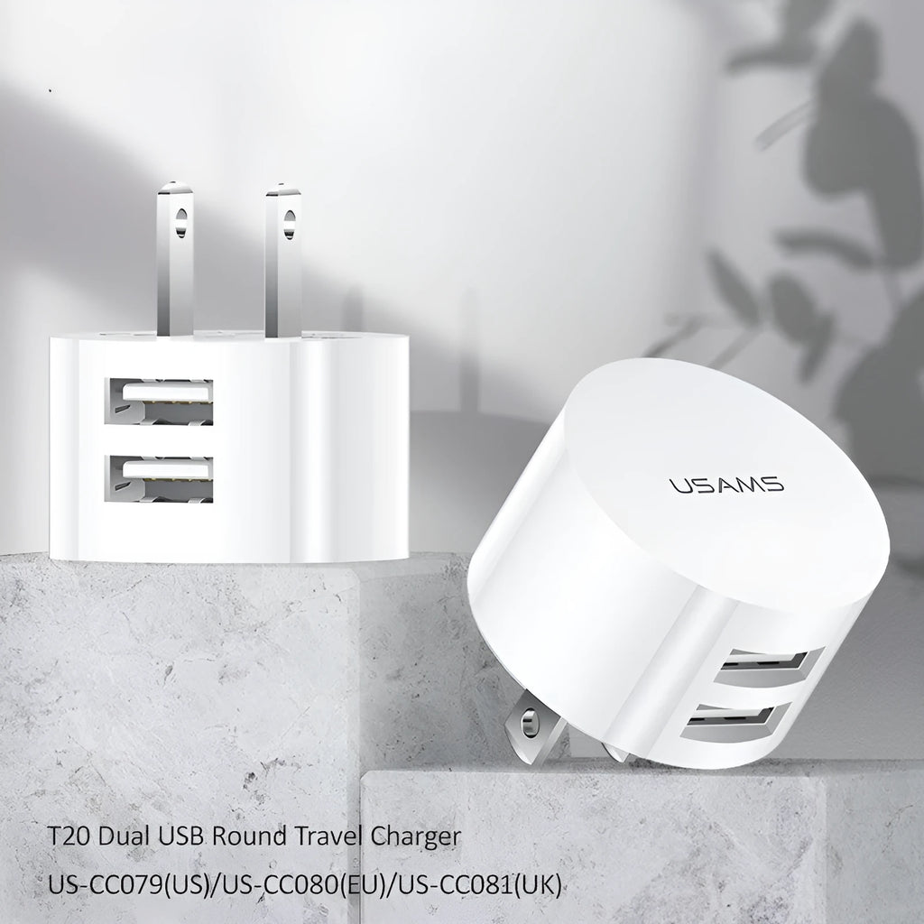 White portable universal dual USB phone charger with US EU UK plug compatibility and 39mm diameter