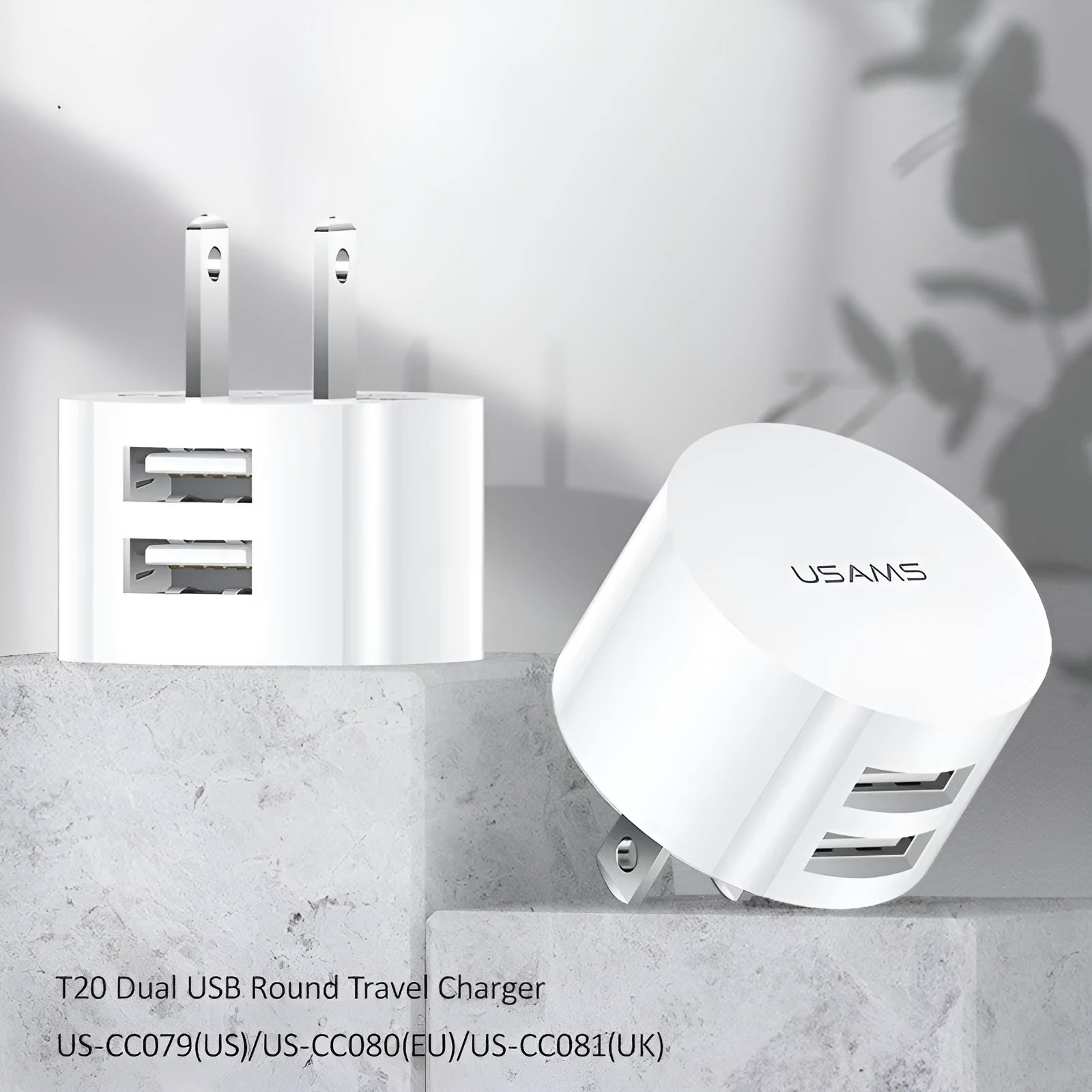White portable universal dual USB phone charger with US EU UK plug compatibility and 39mm diameter