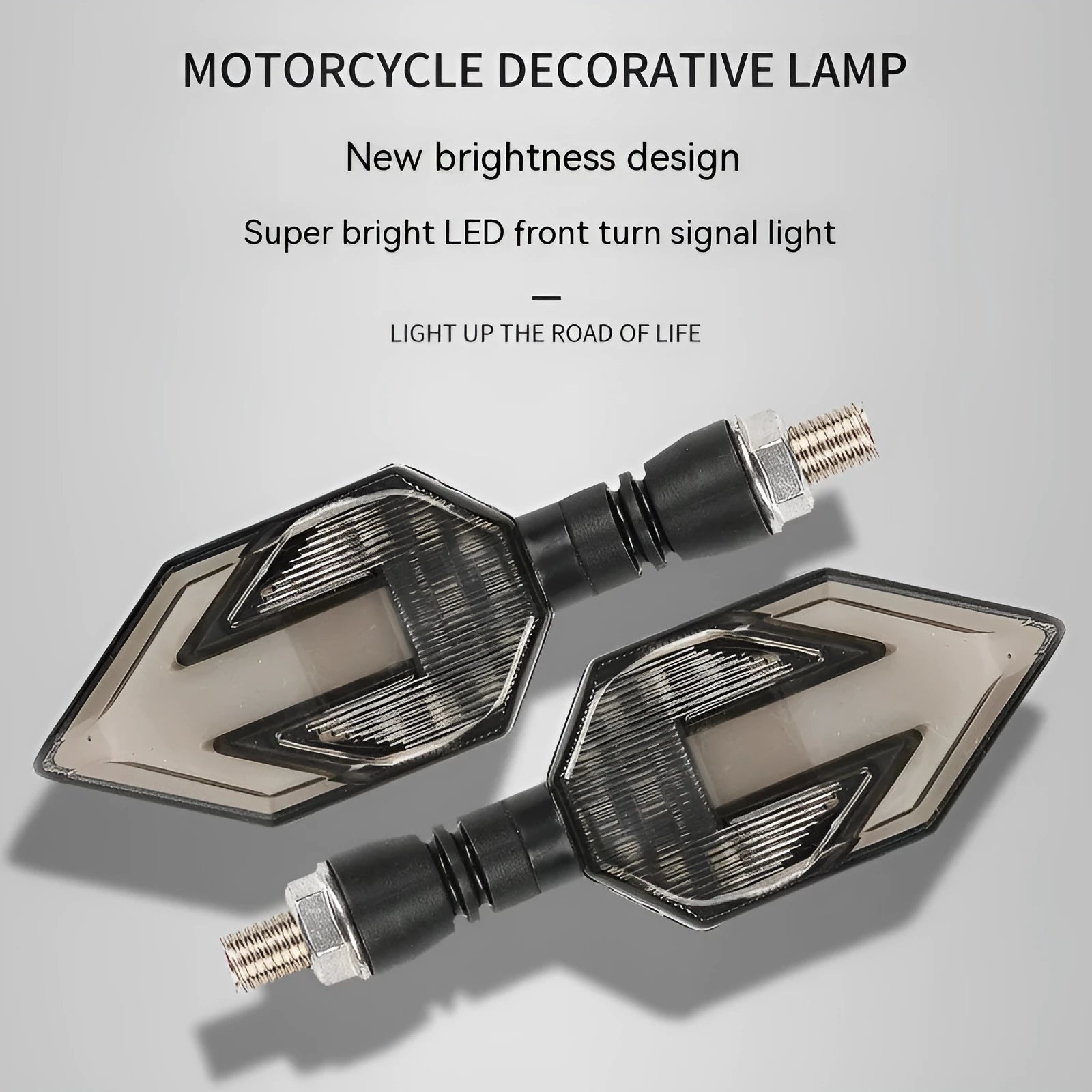 Arrow-shaped LED motorcycle turn signal light with 12V label and ABS plastic housing.