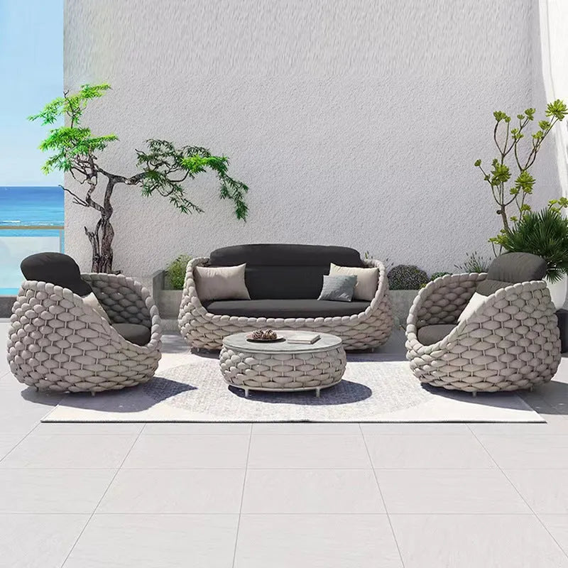 Outdoor patio lounge sofa coffee table set with PE rattan finish, alloy frame, and high-density sponge cushions