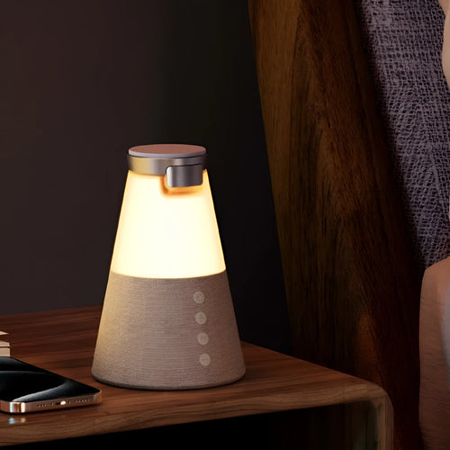 3-in-1 Magnetic Wireless Charging Bluetooth Speaker Night Light in gray finish showing device on a desk