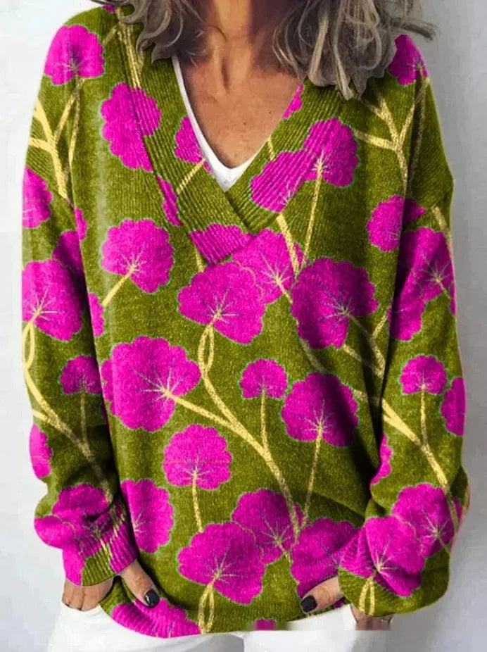 Women's V-neck long sleeve sweatshirt with a textured 3D floral print pattern in a retro style.