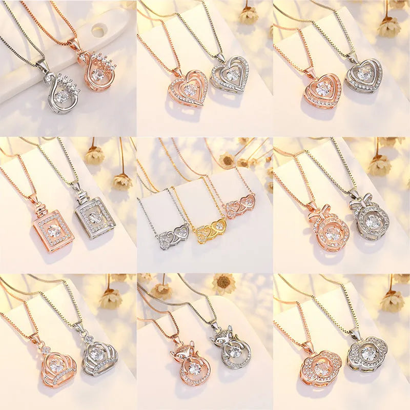 Women's silver heart-shaped necklace pendant featuring a crown and bow design on an adjustable chain.