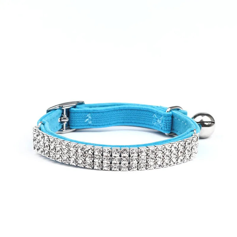 Red velvet cat collar with rhinestones, showing adjustable strap and 1cm width.
