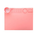 Large light blue silicone painting mat with dimensions 50cm by 40cm laid flat on a table.