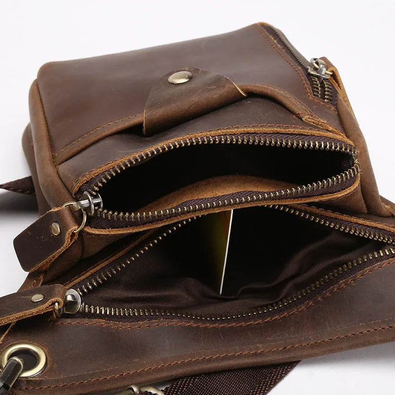 Men's vintage brown crazy horse leather satchel bag with flap closure and carry handles.