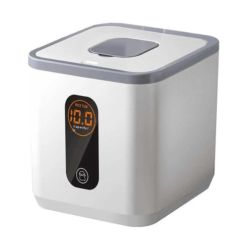 Grey plastic household rice storage jar with a sealed lid and a measuring cup.