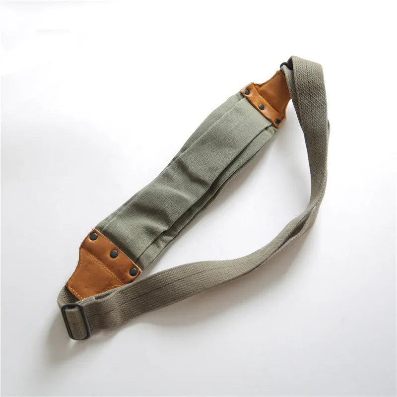 Green retro military style chest bag made from canvas with Italian leather trim