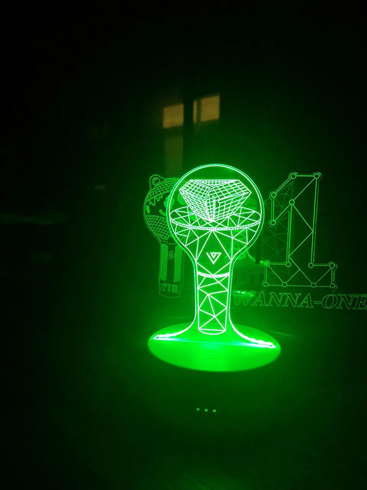 Clear acrylic stand for BTS Light 101 BTS Tower Gem album display on a table.