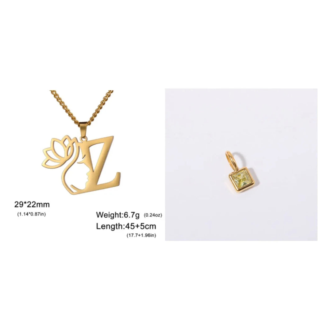 Gold electroplated stainless steel necklace with a cross chain and a letter 'A' pendant on a white background.