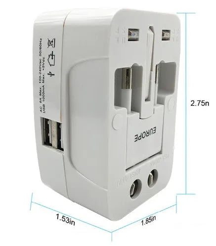 White universal travel plug adapter on a grey background showing its compact size.