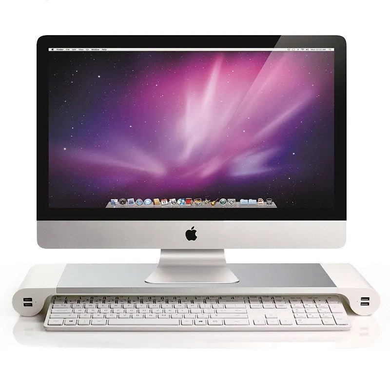 Silver aluminium alloy notebook computer heighten base bracket with USB charging port on a desk