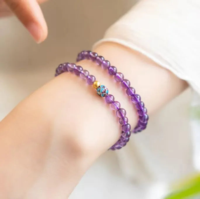 Nine purple lotus bracelet with mixed materials and retro styling for women.
