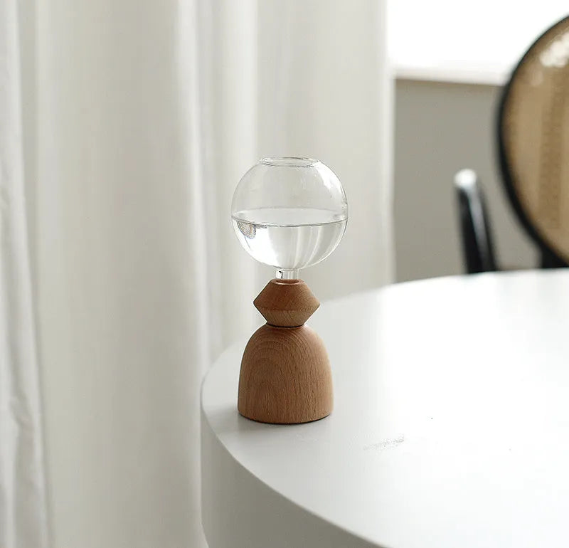 Nordic geometric bubble glass vase with wooden base showing conical and arc bottom designs