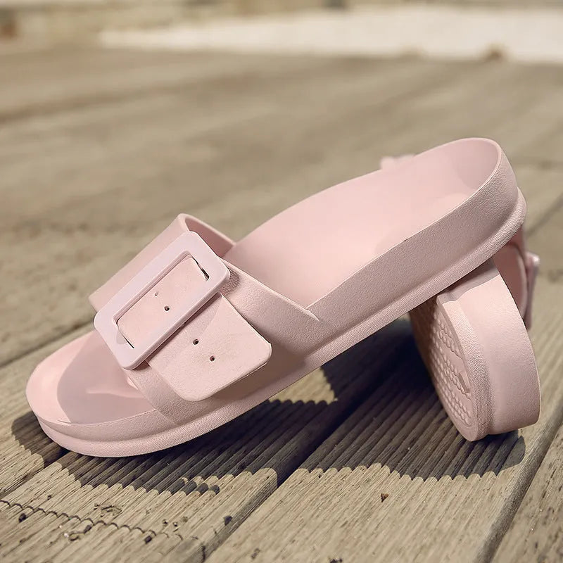 Women's grey blue EVA buckle slipper with a 1.5cm thick sole and adjustable strap.