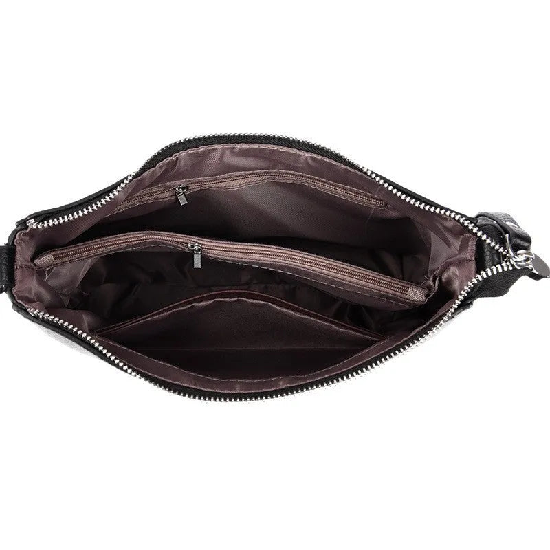 Genuine leather crossbody bag with metal belt decoration, horizontal square shape, available in khaki and other colours