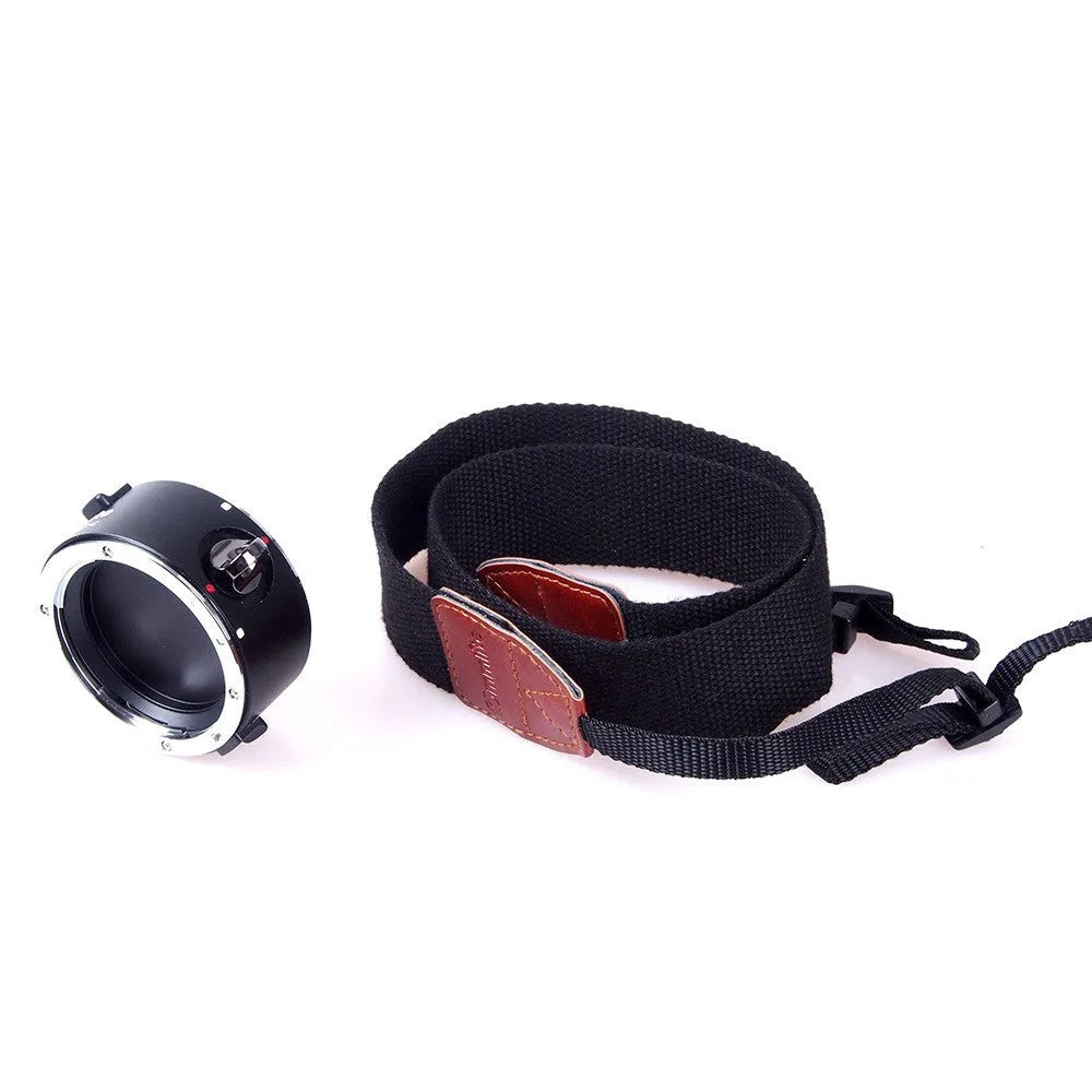Aluminium alloy Nikon E-Mount camera lens flipper dual holder with cotton shoulder strap.