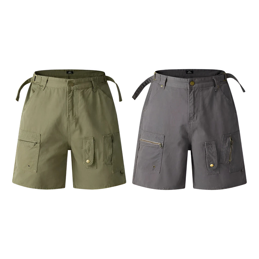 Retro loose-fit workwear shorts for men and women in washed cotton with a zipper fly, shown in grey colour.