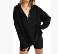 Women's loose peacock green polyester sweater with raglan sleeves, laid flat.