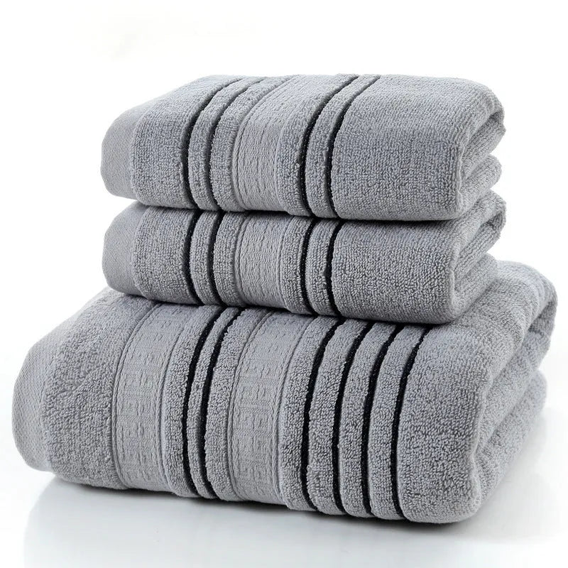 Pure cotton household towel set showing hand towels and bath towel in neutral colour options