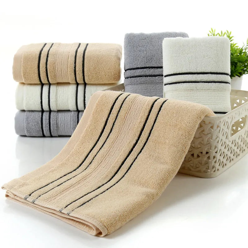 Pure cotton household towel set showing hand towels and bath towel in neutral colour options