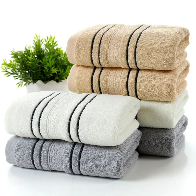 Pure cotton household towel set showing hand towels and bath towel in neutral colour options
