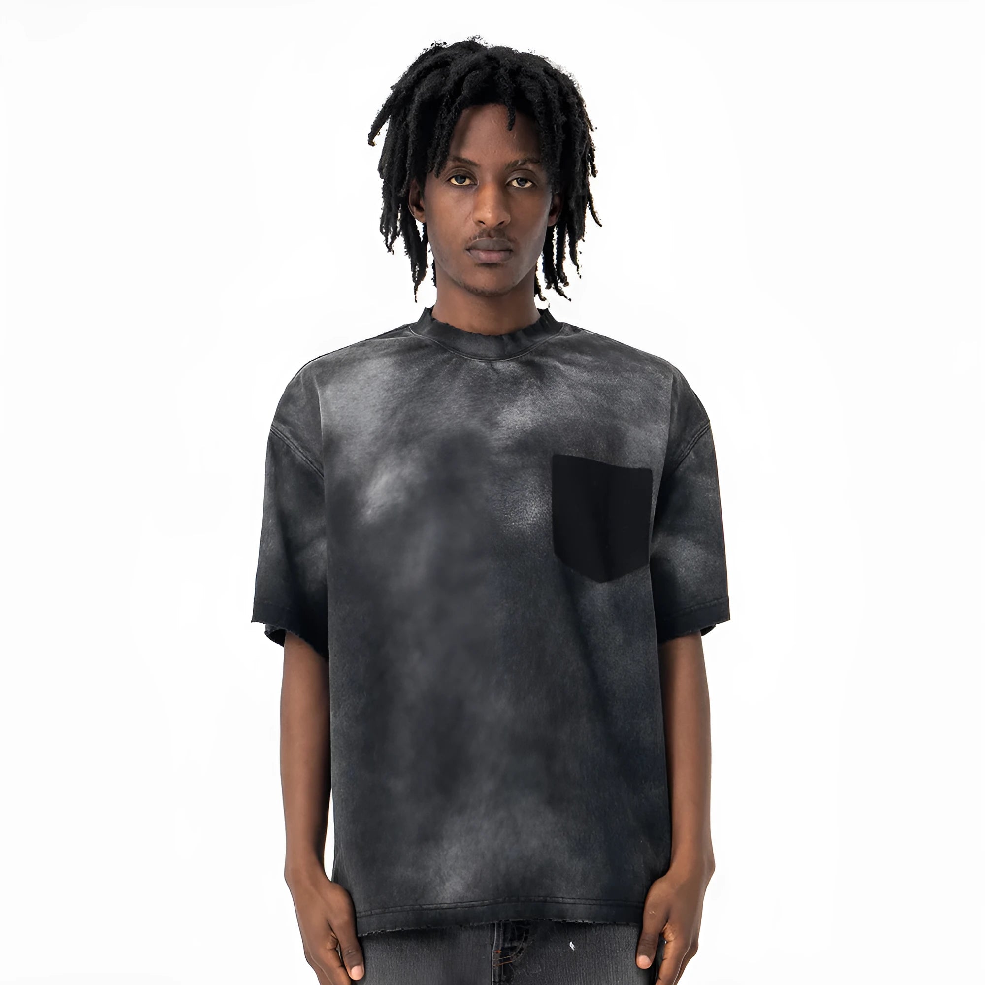 Black loose-fit men's cotton t-shirt with drop-shoulder sleeves on a grey background.