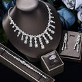 White copper inlaid zircon four piece jewellery set with love heart, water drop, and bell patterns including necklace, earrings, bracelet, and ring