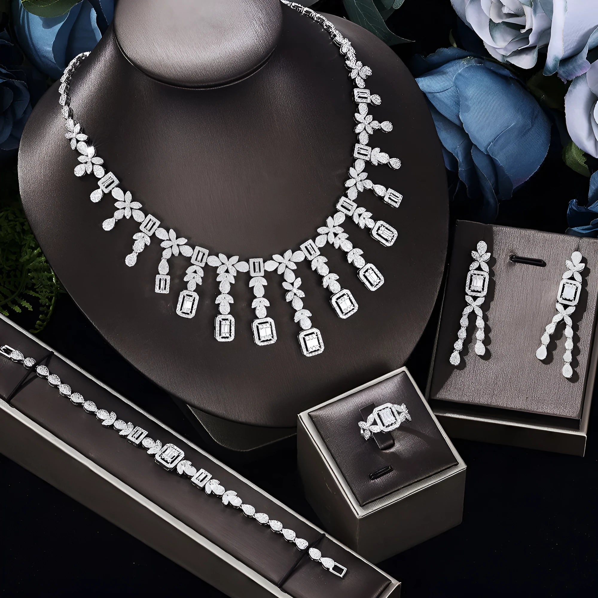 White copper inlaid zircon four piece jewellery set with love heart, water drop, and bell patterns including necklace, earrings, bracelet, and ring