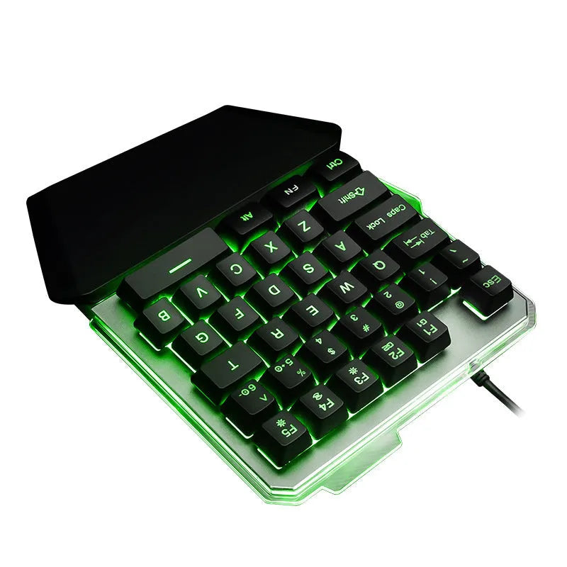 Black Robotic G40 Flow one-handed mechanical keyboard with RGB backlit keys on a desk.