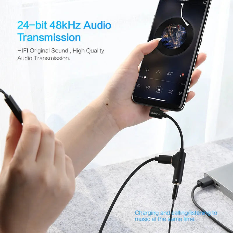 Black Lightning to 3.5mm audio adapter with charging port for iPhone headphones and power