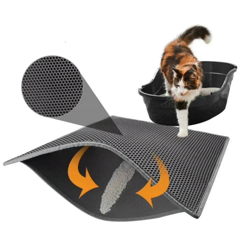 Black waterproof EVA cat litter mat with honeycomb surface for trapping litter, shown next to a litter box.