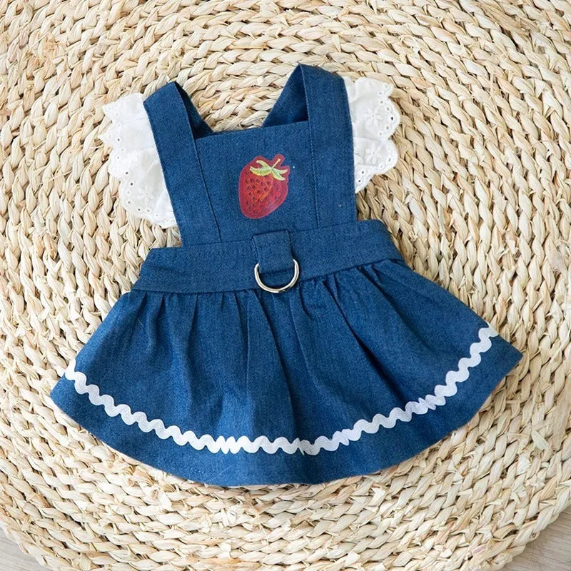Bondi Blue dog skirt with strawberry print and elastic waistband on a small dog.