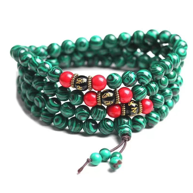 Turquoise Tibetan bracelet with 108 synthetic stone powder beads in round polished finish