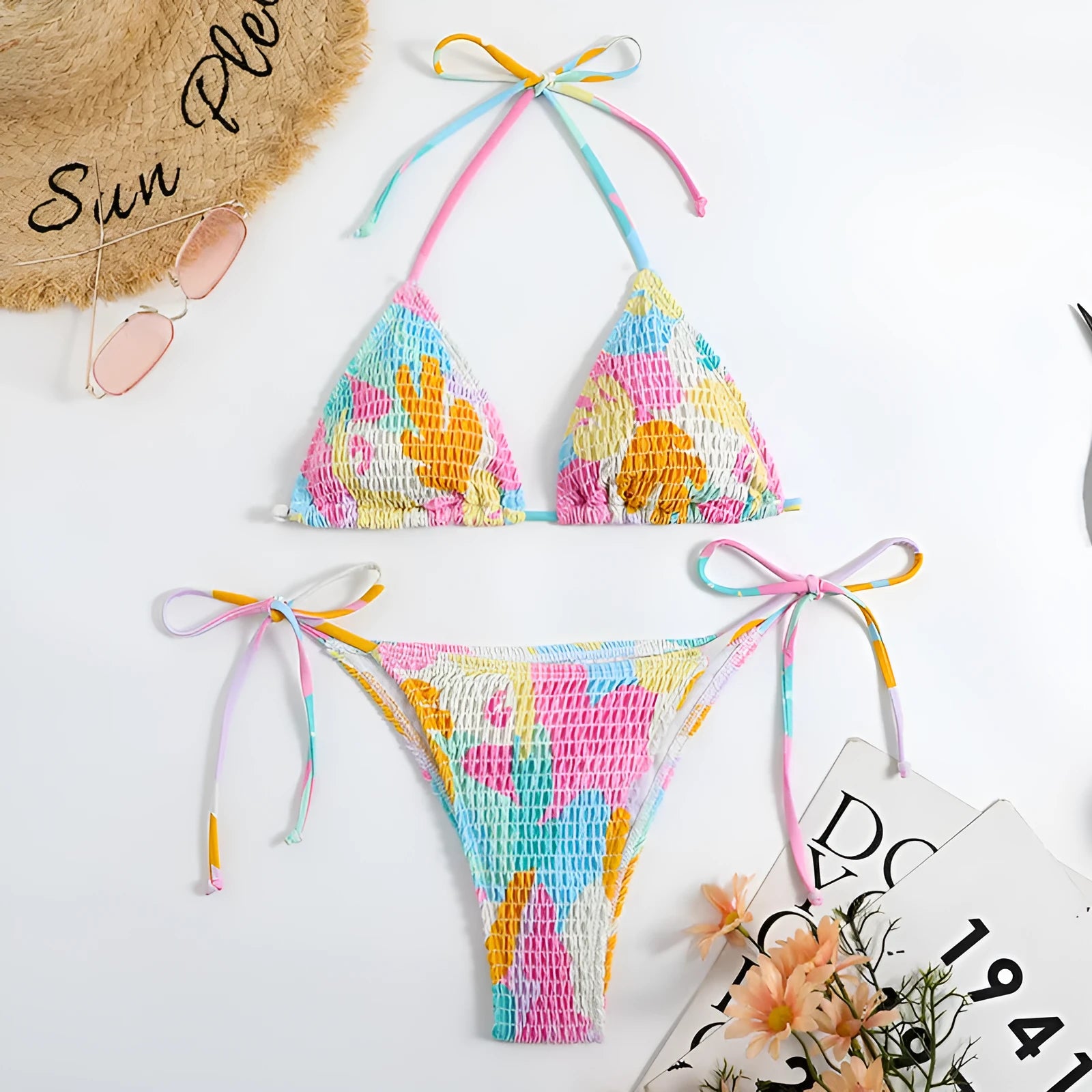 Women's triangle bikini swimming suit with floral gradient pattern and smocking craft detailing