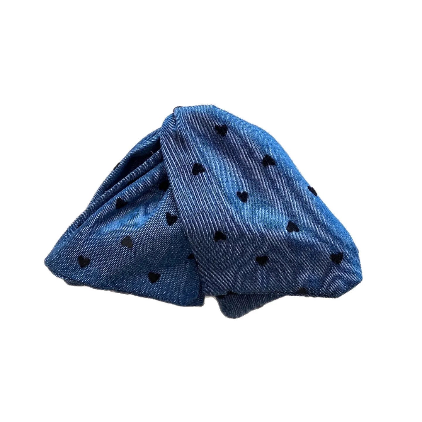 Handmade plastic hairpin with triangle grip shape and bow decoration