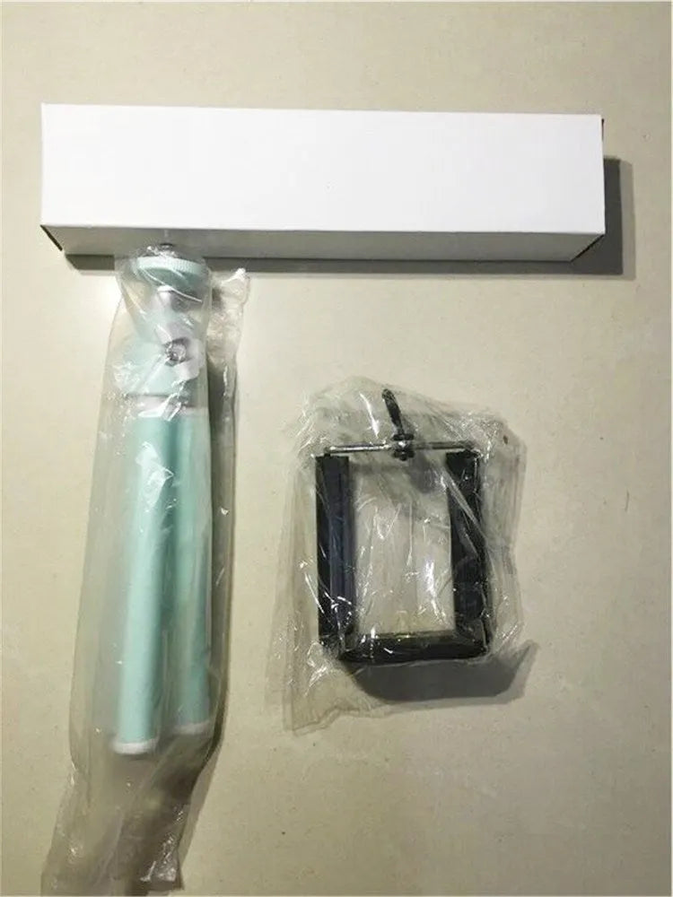Black desktop mobile phone holder with adjustable two-section bracket for hands-free viewing.
