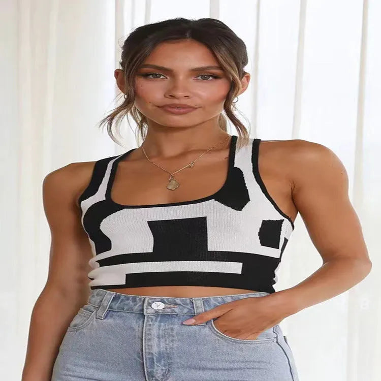 Women's slim fit camisole vest with U collar and exposed navel design in a contrasting colour.