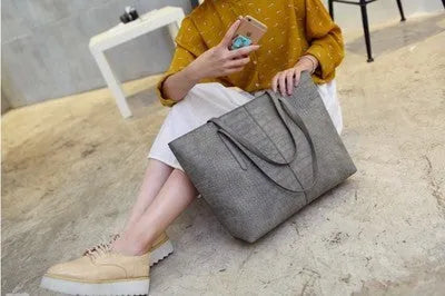 Simple European-style women's shoulder handbag in black or grey for spring summer casual wear