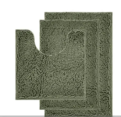 Chenille U-shaped three-piece bathroom carpet set in green beside a toilet.