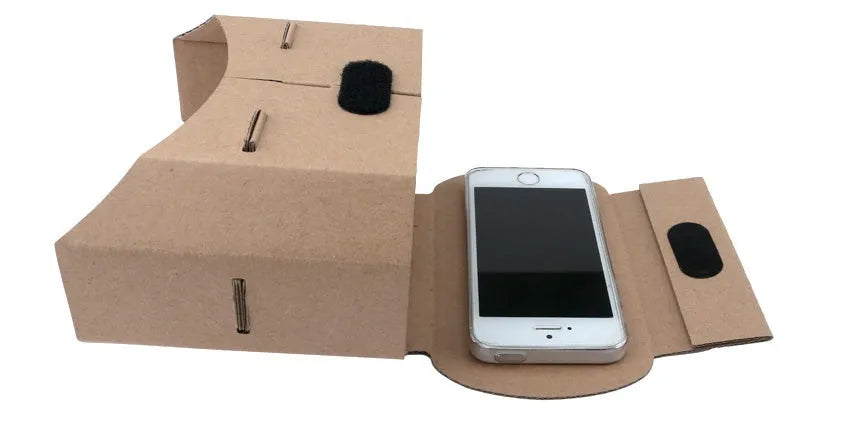 Cardboard virtual reality glasses headset for mobile phones on a white background.