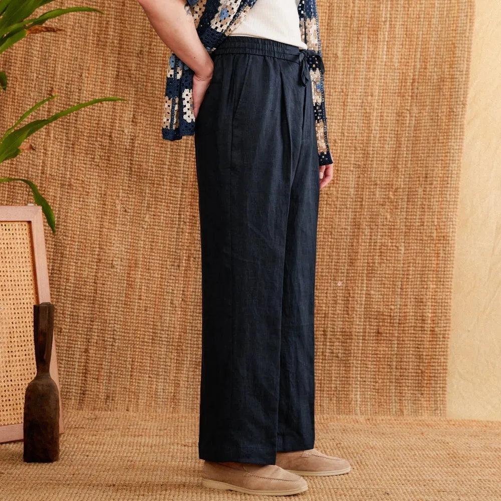 Linen high waist straight-leg trousers with elasticated waistband in greige colour.