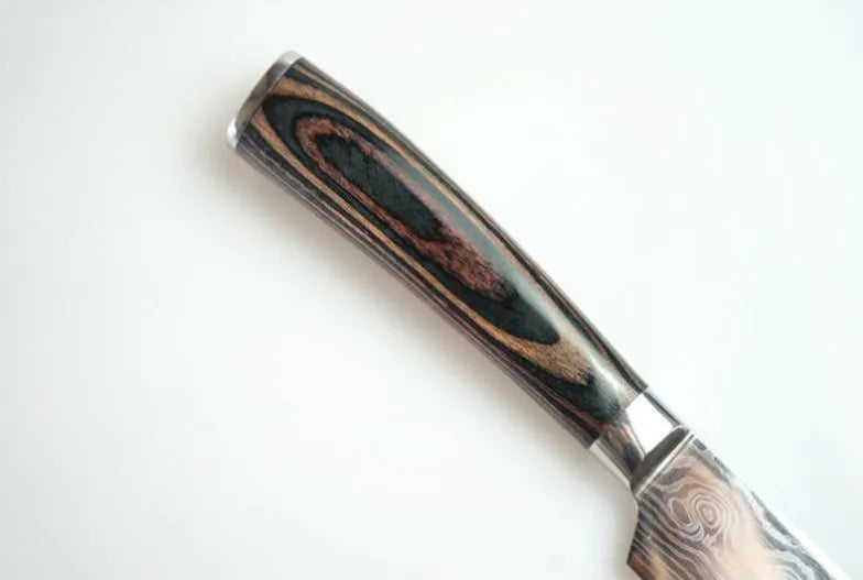 Stainless steel kitchen chef knife with laser Damascus pattern on blade and coloured wood handle.